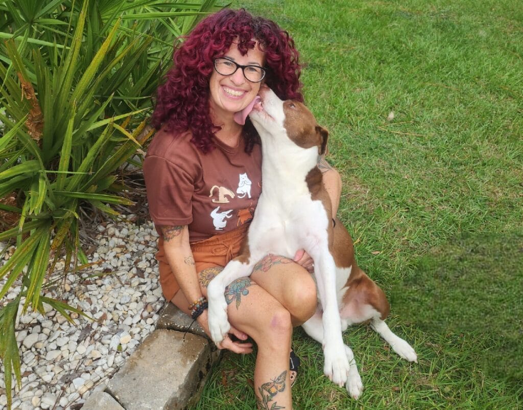 Danette with pets in her care